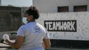 An HLB Zambia volunteer at work during a corporate social responsibility activity